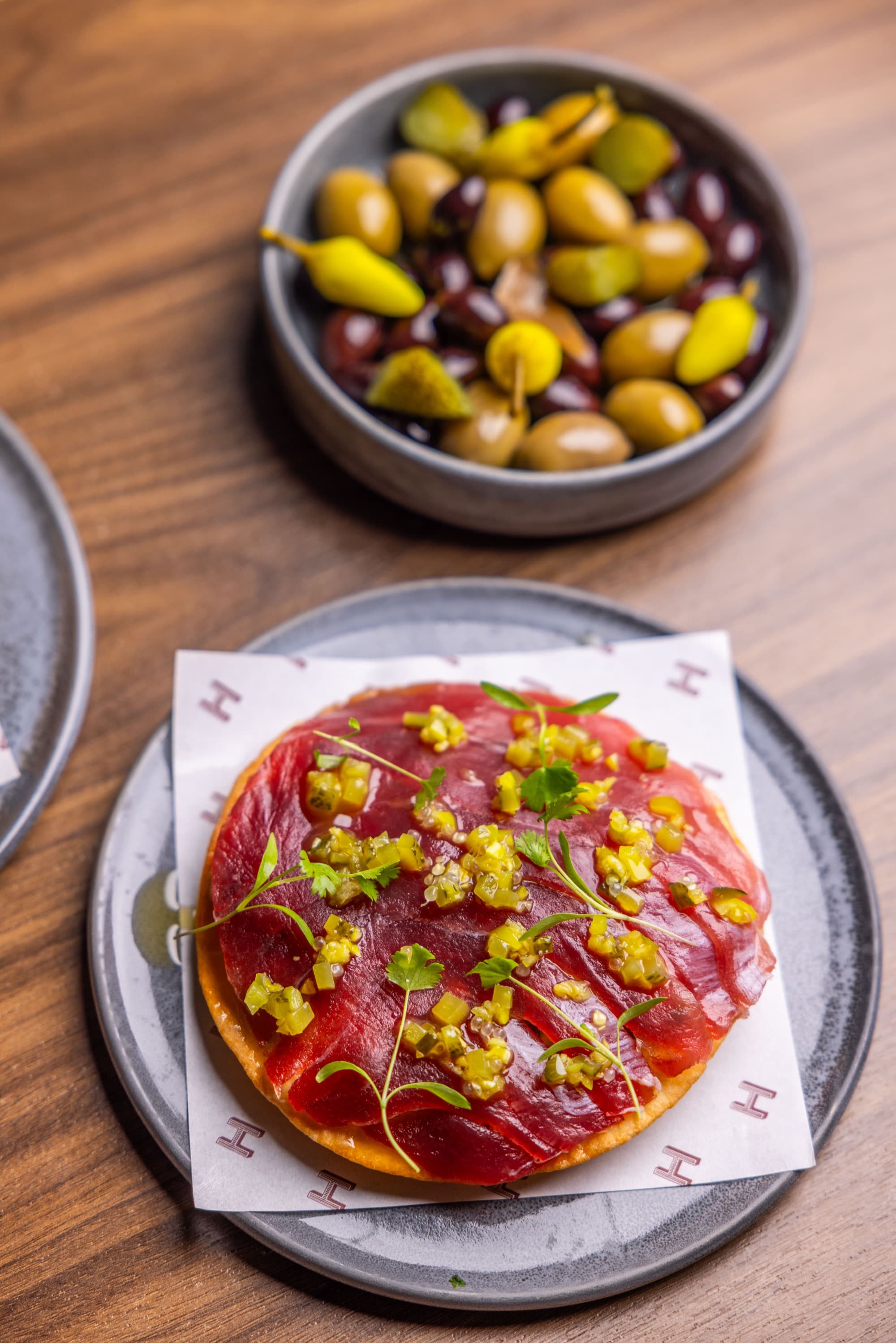 Bistro H carpaccio plating — modern Australian cuisine at Humphrey's Hotel