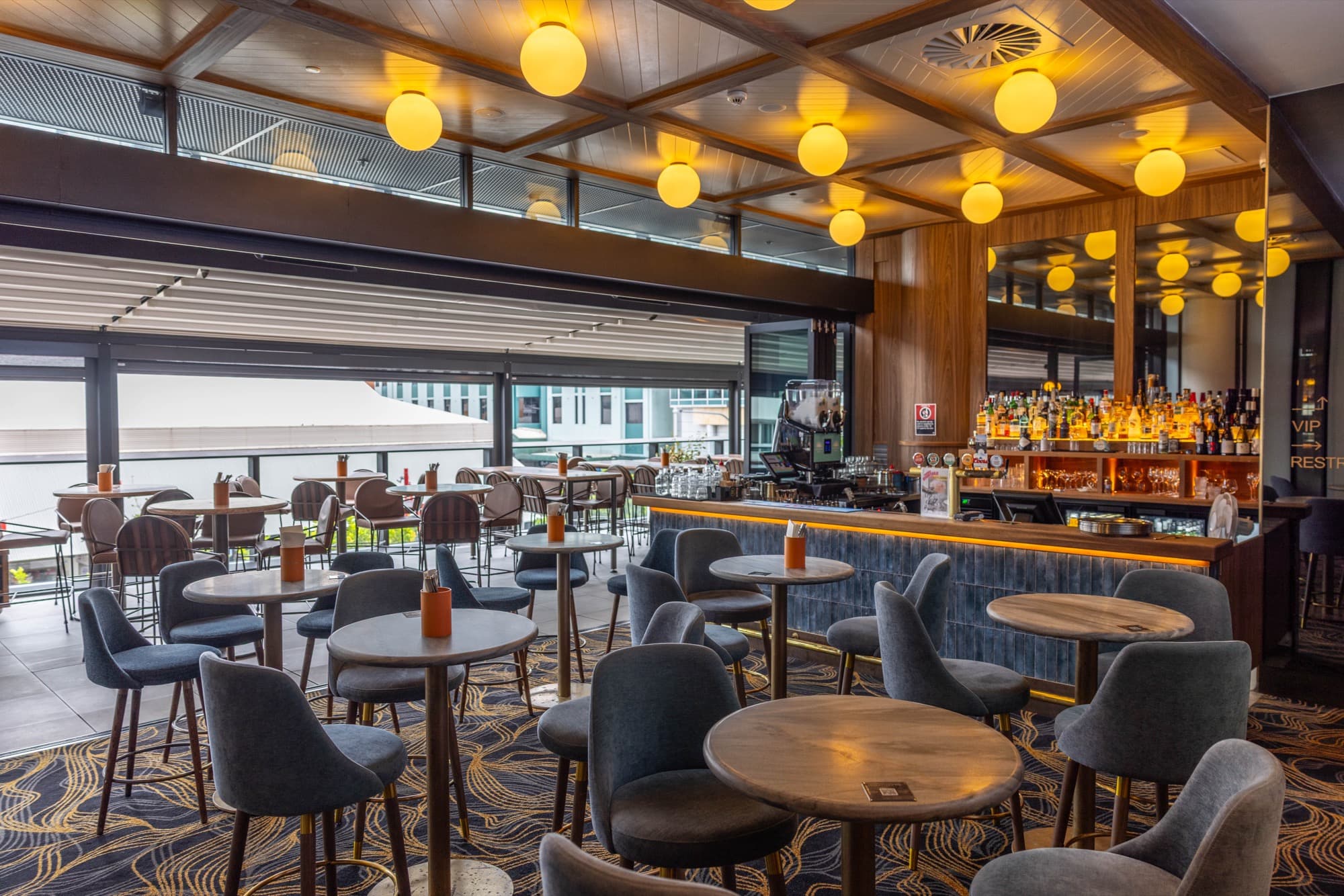 Humphrey's sports bar interior with big screens and terrace in Hurstville